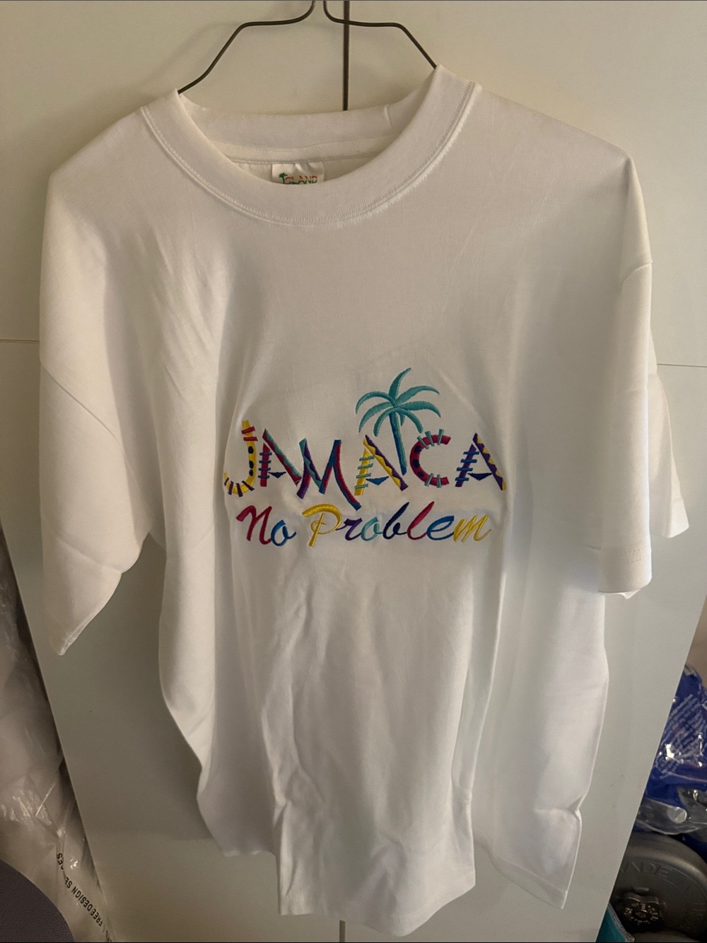 Tela White Tee with Colorful 'Jamaica No Problem' Graphic